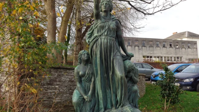 Modern statue of Boudica and her children near Brecon Library in Wales.