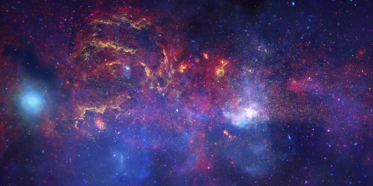 Galactic Center composite combining Hubble, Spitzer, and Chandra observations with assigned colors.