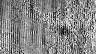 LRO image composite used to identify changes near McGetchin crater. Arrows mark the impact area; the bright material is ejecta, not the crater itself.