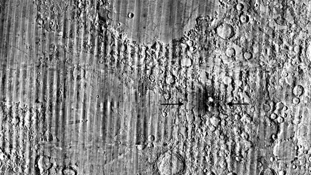 LRO image composite used to identify changes near McGetchin crater. Arrows mark the impact area; the bright material is ejecta, not the crater itself.