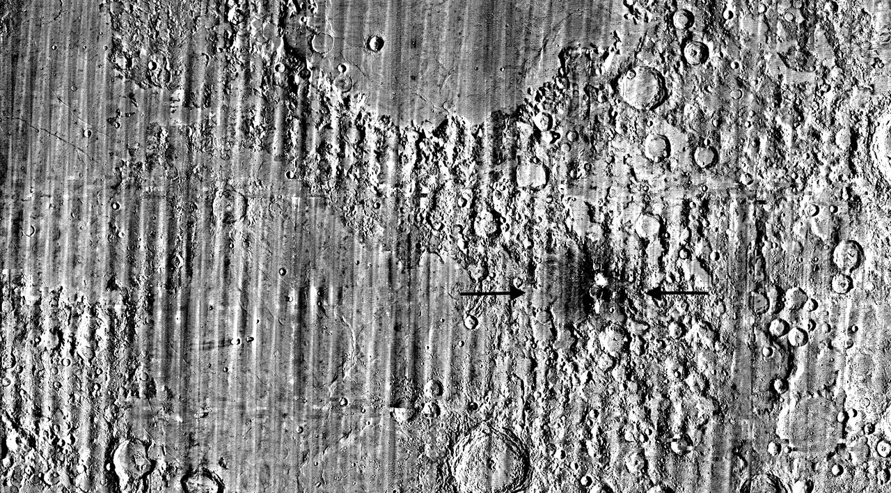 LRO image composite used to identify changes near McGetchin crater. Arrows mark the impact area; the bright material is ejecta, not the crater itself.