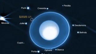 Annotated Webb NIRCam composite showing Uranus, rings, known moons, and S/2025 U1. Color is assigned to infrared data.