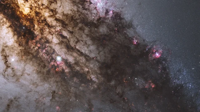 Hubble image of Centaurus A, used as a bright-galaxy comparison. This photograph is not Nube.