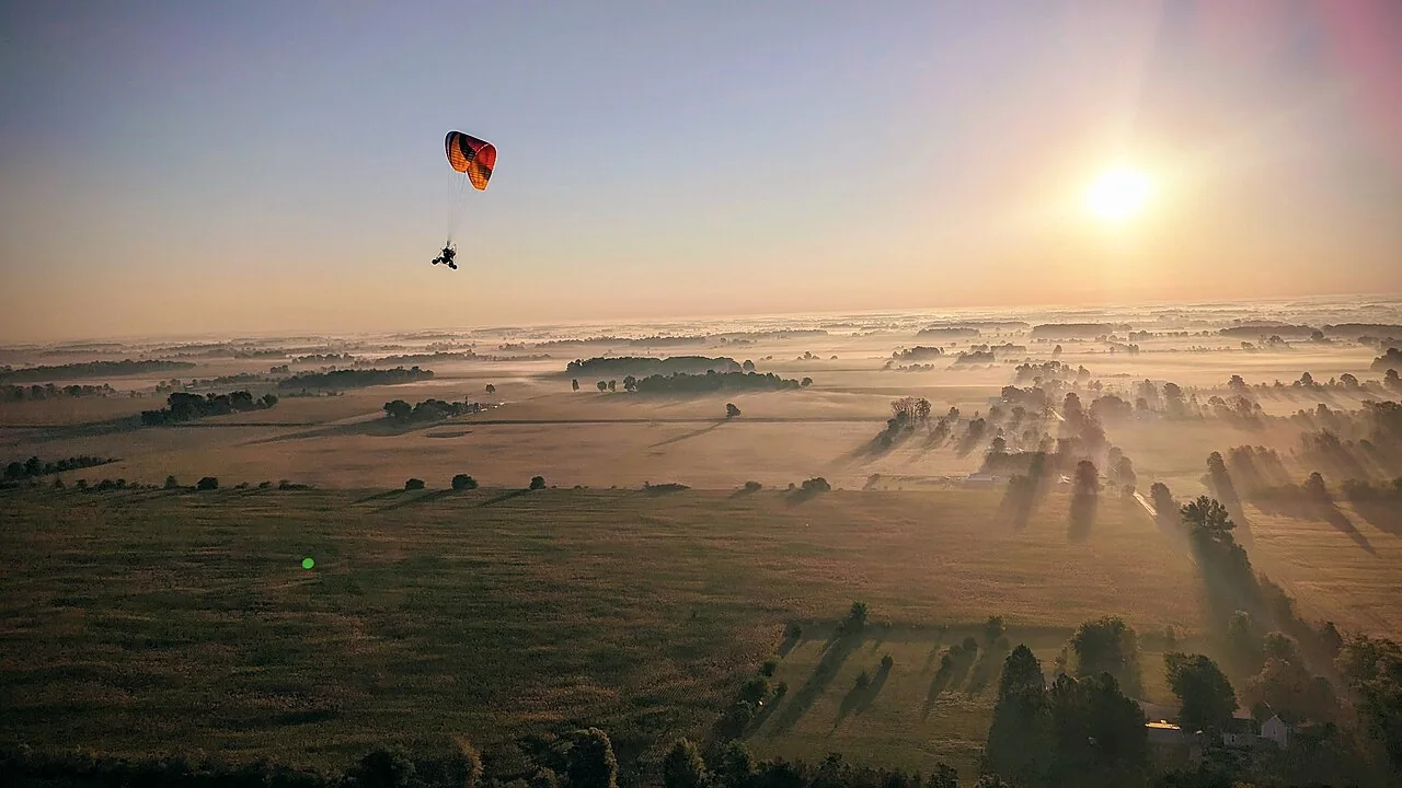Powered paragliding in Alexandria. Context photograph, not the reported Colorado commute.