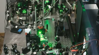 Laser laboratory equipment, used as a contextual image rather than a picture of entanglement.