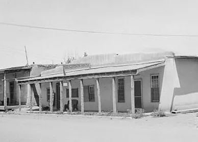 Archival photograph of Kit Carson House in Taos, New Mexico, providing local context.